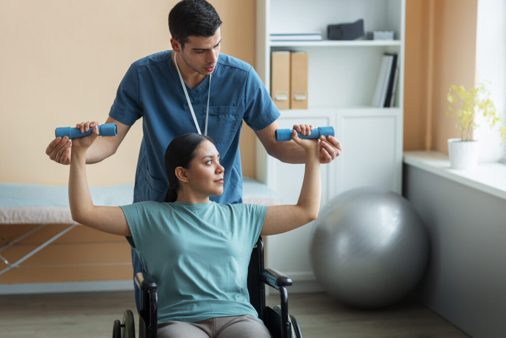 doctor helping patient during rehabilitation scaled
