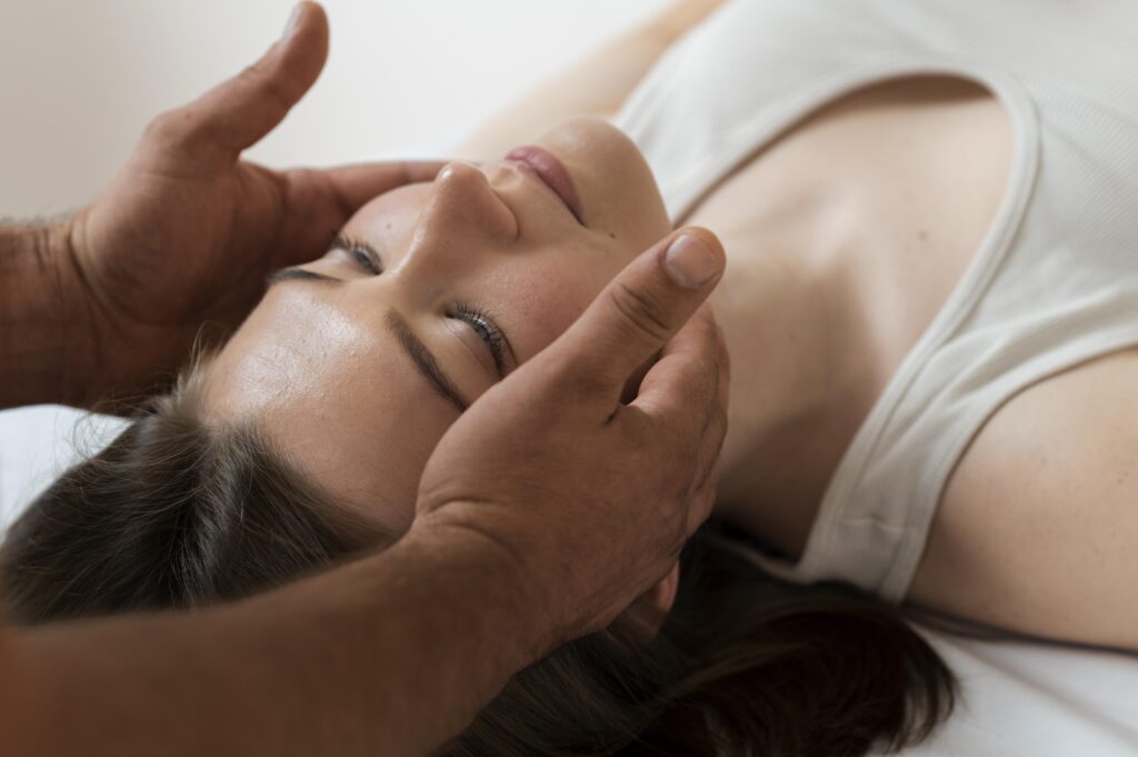 osteopathy patient getting treatment massage scaled